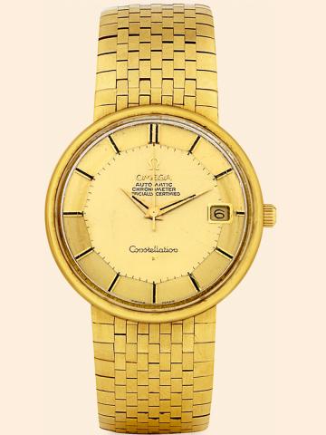 Yellow Gold Constellation.Omega, Constellation, Automatic Chronometer, Officially Certified, Ref. 7190. Made in the 1960s..Very fine and rare, center seconds, self-winding, water-resistant, 18K yellow gold wristwatch with date and an.integral textured 18K