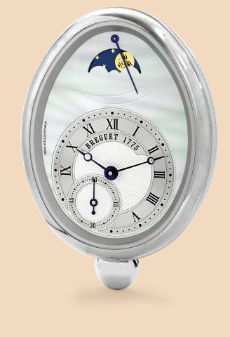 Breguet, Ref. 9910, Reine.de Naples. Made in 2007..Fine wall clock with two.quartz movements. Accompanied by the original.fitted box and instruction manual.