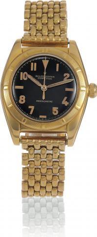 Black California Dial.Rolex, Oyster Perpetual Chronometer, case No. 645890, Ref. 5011/5015. Made circa 1950..Fine and rare, tonneau-shaped, center seconds, self-winding, water-resistant, 18K yellow gold wristwatch with a yellow gold.Rolex bracelet with de