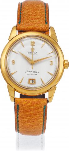 Yellow Gold Ref. 2627 SC..Omega, Seamaster Calendar, movement No..14349170, case No. 11082624, Ref. 2757 SC. Made in 1954..Fine, center-seconds, self-winding, water-resistant, 18K yellow gold.wristwatch with date.