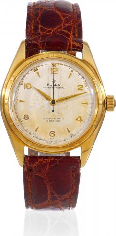 Big Bubble.Rolex, Oyster Perpetual, Officially.Certified Chronometer, case No..660596, Ref. 5029. Made in 1949..Fine and rare, large, center-seconds, selfwinding.waterresistant 18K yellow gold.chronometer wristwatch with a gold-plated.Rolex buckle.