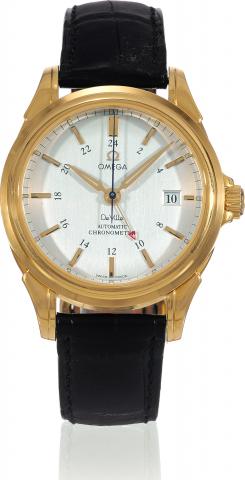 De Ville Co-Axial.Omega, De Ville Co-Axial GMT, Automatic Chronometer.case No. 80079808, Ref. No. 46333031. Made circa.2000, sold on December 11ft, 2001..Fine, two-time zone, center-seconds, self-winding, waterresistant.18K yellow gold wristwatch with dat