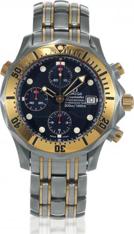 Seamaster Professional Chronograph.Omega, Seamaster Professional, Chronometer.movement No. 50000623, Ref. 22978000. Made in the 2000s..Fine, water-resistant titanium and 18K yellow gold diver