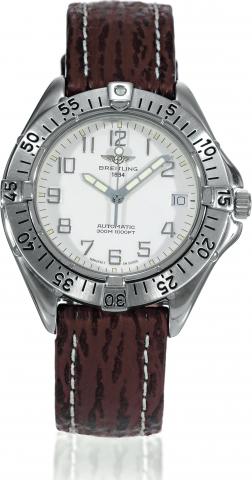 Breitling, 1884, Colt, Automatic.300m/1000 ft, case No. 3492.Ref. A17035. Sold on January.26th, 1993..Fine, water-resistant, self-winding, centerseconds.stainless steel wristwatch with.date and a stainless steel Breitling buckle..Accompanied by a guarante
