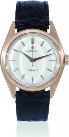 Pink Gold OCC.Rolex, Oyster Perpetual, Officialy Certified Chronometer, case No. 689470, Ref. 6028. Made in 1950..Fine and rare, tonneau-shaped, center seconds, self-winding, water-resistant, 18K pink gold wristwatch with a Super Oystercrown.and a gold-pl