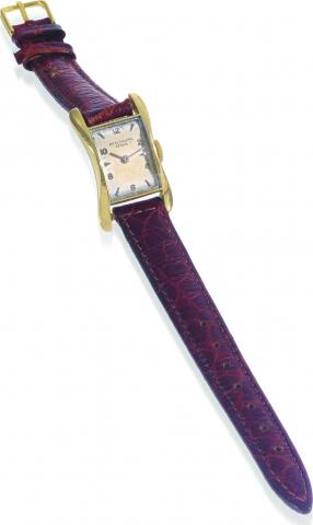 Yellow Gold, Baby Banana.Patek Philippe, Geneve, movement No. 947420, case No. 683346, Ref. 2296. Made in 1955, sold on November 25th, 1955..Very fine and rare, small, 18K yellow gold wristwatch. Accompanied by the Extract from the Archives.