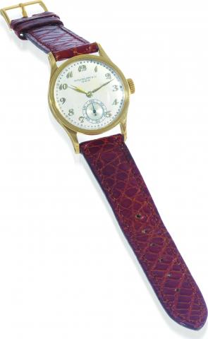 Yellow Gold, Ref. 448.Patek Philippe Co., Geneve, movement No. 826007, case No. 294755, Ref. 448. Made in 1930, sold on March.10th, 1937..Fine and rare, small 18K yellow gold wristwatch with an 18K yellow gold Patek Philippe buckle. Accompanied by the E