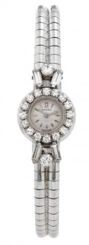 White Gold and Diamonds.Omega, case No. 1148024, Ref. 073. Made in the 1960s..Very fine, 18K white gold and diamond lady