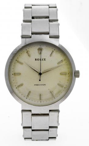 Ref. 9083.Rolex Precision. Made in the 1960s..Fine, center seconds, stainless steel wristwatch with an integral.stainless steel Rolex Oyster bracelet.
