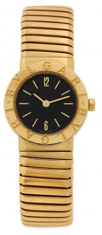 Bulgari, Ref. BB 26 2T. Made in the 1990s..Fine, water-resistant, 18K yellow gold lady's quartz.wristwatch with an integrated 18K yellow gold Bulgari.Tubogas bangle bracelet..To be sold without reserve