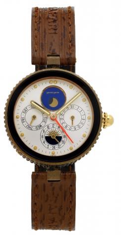 G_rald Genta Gefica, Ref. 2778.7. Made in the 1990s..Fine and unusual, astronomic,water-resistant, bronze-colored, black onyx and stainless steel quartzwristwatchwith day.and date, 24 hour day/night indication, special 12 hour elapsed time hand, moon phas