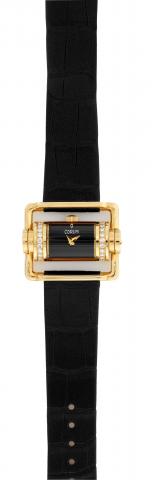 Corum, No. 1706843, Ref. 130.330.65. Made in the.early 2000s..Fine and unusual, semi-cylindrical, 18K yellow gold and.diamond lady s driver