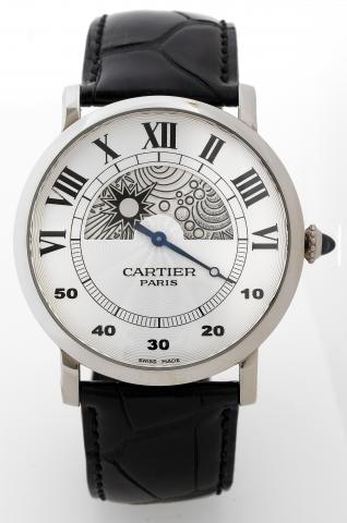 Rotonde, Day and Night.Cartier, Paris, Collection Priv_e, Rotonde Day and.Night, case andmovementNo. 115, Ref. 28731.Made.circa 2006..Very fine and rare, large, water-resistant, 18K white gold wristwatch.with retrograde minute hand, special day and night.