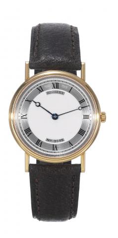 Breguet, No. 3595, Ref. 3500. Made circa 2000..Fine and elegant, thin, 18K yellow gold wristwatch with an 18K yellow gold Breguet buckle. Accompanied by a box and.certificate.