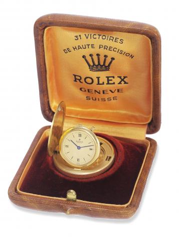 Viceroy Coin Watch.Rolex, Geneva, Viceroy, Ref..3789. Made in the 1980s..Fine and rare, extra thin, 18K yellow gold.watch set into an Albanian 100 franc coin.dated 1926. Accompanied by a fitted Rolex.box.