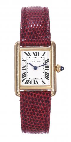 Cartier, Tank, case No. 370373MG.Ref. 2442. Sold on September.2002..Fine, rectangular, 18K yellow gold lady