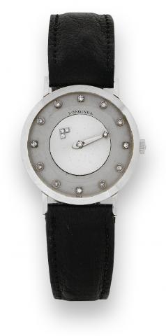 Myst_rieuse.Longines, Myst_rieuse, cased by Longines-Wittnauer Watch Co., New York-Montreal No. 11249751.Ref. 1017. Made in the 1950s..Fine and unusual, 14K white gold and diamond mystery wristwatch.
