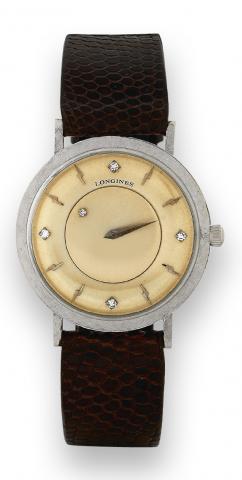 Myst_rieuse.Longines, Myst_rieuse, cased by Longines-Wittnauer Watch Co., New York-Montreal. Made in the 1950s..Fine and unusual 14K white gold and diamond mystery wristwatch.