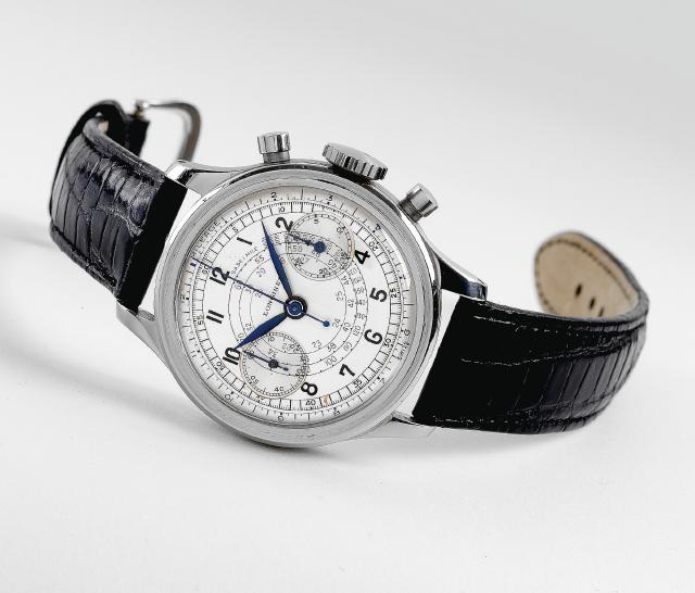 13ZN Steel Chronograph.Longines, No. 6057903, case No. 21153, Ref. 205. Made in the 1950s..Fine and rare, stainless steel wristwatch with round button chronograph, register, telemeter and tachometer.