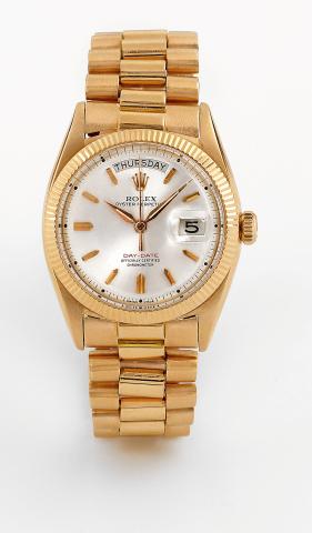 Ref 6511 Pink Gold Day-Date.Rolex, Oyster Perpetual, Day-Date, Officially Certified Chronometer, Ref. 6511. Made circa 1958..Fine and rare, tonneau-shaped, center seconds, self-winding, water-resistant, 18K pink gold wristwatch with day.date and an 18K pi