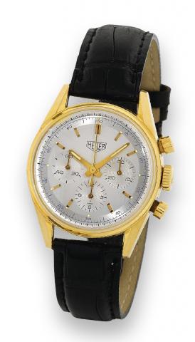 Carrera Chronograph.Heuer, Carrera, 1964 re-edition, case No. 0318.Ref. CS3140. Made circa 2000..Fine, water-resistant, 18K yellow gold wristwatch with round.button chronograph, registers and a Heuer 18K yellow gold.buckle. Accompanied by a fitted box, gu