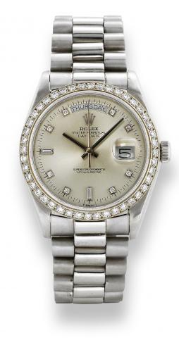 Platinum Day-Date, Ref. 18046.Rolex, Oyster Perpetual, Day-Date, Superlative Chronometer Officially Certified, Ref. 18046. Made in the 1980s..Fine and rare, tonneau-shaped, center seconds, self-winding, water-resistant, platinum and diamond wristwatch wit