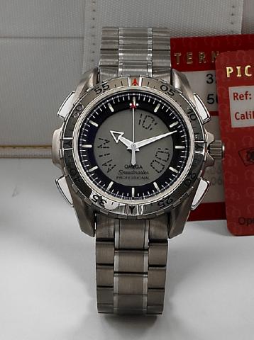 Omega, Speedmaster Professional X-33, Ref. 32905000.No. 56222266, Ref. TS 186.1998. Sold on July 29, 1998..Fine and rare, tonneau-shaped, light-weight, titanium and stainless.steel quartz wristwatch with square button chronograph, gray.multifunction digit