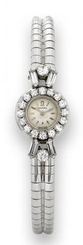 White Gold and Diamonds.Omega, case No. 1148024, Ref. 073. Made in the.1960s..Very fine, 18K white gold and diamond lady