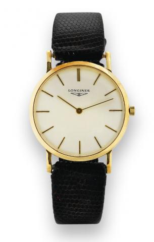 Longines, No. 12586439, Ref. 6900. Made in the 1960s..Fine and elegant, thin, 18K yellow gold wristwatch with a gold-plated Longines buckle. Accompanied by.a box..To be sold without reserve