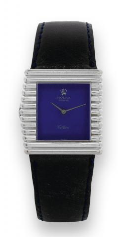 Rolex, Cellini, Ref. 4015. Made in the 1970s..Fine and elegant, asymmetrical square, 18K white gold left-handed wristwatch with a plated Rolex buckle. Accompanied.by its original fitted box.