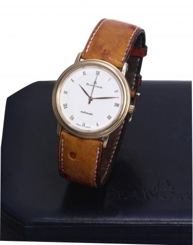 Yellow Gold Villeret.Blancpain, Villeret, Automatic, No. 989, Ref..0095/418. Sold on October 6, 1989..Fine, thin, center seconds, 18K yellow gold wristwatch, date.with an 18K yellow gold Blancpain clasp. Accompanied by a.fitted box and certificate..To be 