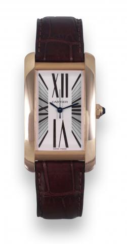 Tank Am_ricaine, Pink Gold.Cartier, Tank Am_ricaine, Automatic, case No. 778712CD, Ref. 2505. Sold on October 1, 2004..Fine, rectangular curved, center seconds, self-winding, water-resistant, 18K pink gold wristwatch with an 18K pink gold.Cartier buckle. 