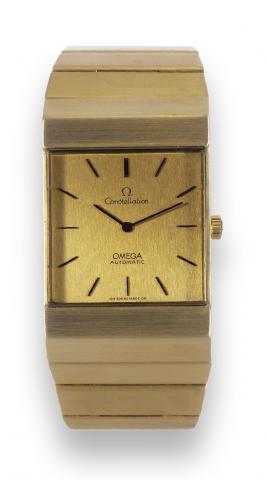 Omega, Constellation, Automatic, No. 35912539, Ref. BA 351.8359. Sold on November 23, 1976..Fine and rare, rectangular, self-winding, 18K yellow gold wristwatch with topaz-colored crystal and an integral.18K tapered gold ingot-link bracelet with concealed