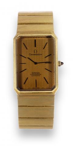 Omega, Constellation, Chronometer, No. 26513578, case No. 8310, Ref. BA 353.0020. Sold on December.10th, 1973..Fine and rare, large, rectangular, self-winding 18K yellow gold chronometer wristwatch with raised topaze-colored.faceted crystal and integral 1