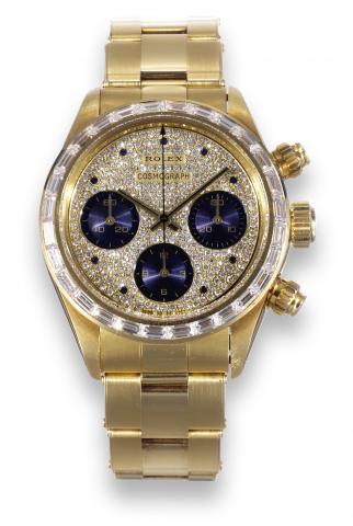 Ref. 6270 Baguette Diamond Cosmograph.Rolex, Cosmograph, Oyster (Superlative Chronometer, Officially Certified), Ref. 6270/6263..Case No. 9091460. Made in 1985..Extremely rare and very fine, water-resistant, 18K yellow gold wristwatch with round button ch