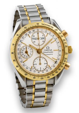 Yellow Gold Triple Date Chronograph.Omega, Speedmaster Automatic, case No..55367064, Ref. 175.0044. Made circa 1990..Fine, self-winding, stainless steel and 18K yellow gold wristwatch.with round button chronograph, registers, tachometer.24-hour indication