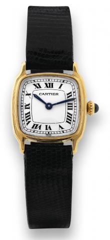 Cartier, Paris, No. 782580129, Ref. 60083. Made in.the 1980s..Fine, cushion-shaped, 18K yellow gold lady