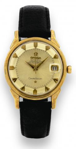 Yellow Gold Constellation.Omega, Automatic, Chronometer, Officially Certified.No. 33087860, Ref. 091919. Made in the 1970s..Fine, center seconds, self-winding, water-resistant, 18K yellow.gold wristwatch with date and a gold Omega buckle..To be sold witho
