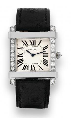 Platinum Tank Chinoise.Cartier, Paris, Tank Chinoise - Mecanique, case No..19588CE, Ref. 2685. Made circa 2004..Very fine, square, water-resistant, platinum and diamond.wristwatch with an 18K white gold Cartier deployant clasp.