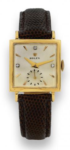 Ref. 4470 Yellow Gold.Rolex, Officially Certified Chronometer, Ref..4470. Made circa 1945..Fine and rare, square, 18K yellow gold and diamond.wristwatch.
