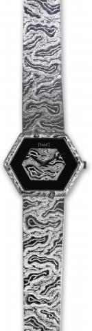 White Gold Onyx.Piaget, movement No. 7804735, case No. 325001.Ref. 9578A17. Made in the 1970s..Very fine, elegant, hexagonal 18K white gold wristwatch with.white gold and black onyx dial and an integral 18K white gold.Piaget textured bracelet.