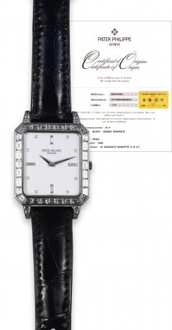 Ref. 5007, Platinum Diamonds.Patek Philippe, Geneve, movement No. 1371944.case No. 4046312, Ref. 5007P. Sold in August.2002..Extremely fine and rare, water-resistant, rectangular, platinum.and 44 diamond-set (4.10 CT.) wristwatch with a Patek.Philippe p