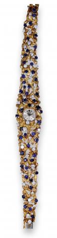Diamond Sapphire Rocaille.Piaget, movement No. 719687, case No. 208083, Ref. 3259. Made in the.1960's..Extremely fine, rare and elegant, 18K yellow gold, diamond and sapphire-set lady
