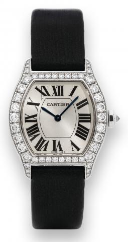 Cartier Tortue, Collection Privee.Cartier Tortue, Ref. 2644, No.100623 LX, made.circa 2006..Fine, 18K white gold, tonneau-shaped, mid-sized, waterresistant.mechanical, diamond-set wristwatch with 18K white.gold Cartier deployant buckle. Accompanied by a C