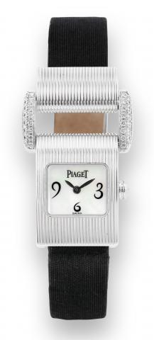 White Gold and.Diamond Miss.Protocole.Piaget, Ref. 5222, made circa 2007..Fine and unusual water resistant, 18K.white gold and diamond set rectangular.lady