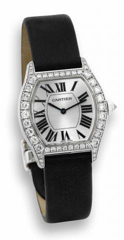 Cartier Tortue, Collection Priv_e.Cartier Tortue, No. 100623 LX, Ref. 2644. Made.circa 2005..Fine, tonneau-shaped, water-resistant, 18K white gold and.diamonds wristwatch with an 18K white gold Cartier deployant.clasp..To be sold without reserve