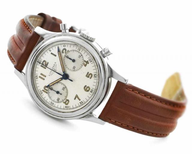 Steel Flyback Cal 30CH.Longines, Flyback Chronograph, No. 8755107, case No. 64741, Ref. 44. Made in the 1950's..Fine and rare, water-resistant, stainless steel wristwatch with round button fly-back chronograph and register.