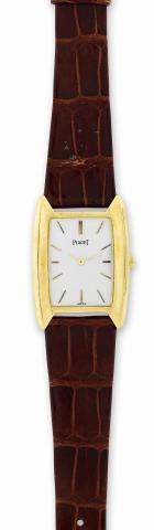 Piaget, No. 6900547, Ref. 9100. Made in the.1980's..Fine and rare, elegant, rectangular, 18K yellow gold wristwatch.with an 18K yellow gold Piaget buckle.