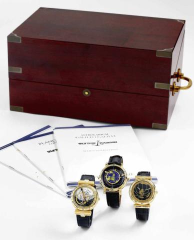 Astronomical Set of Three Watches.No. 086.Ulysse Nardin, Le Locle, set of three 18K yellow gold wristwatches..Made circa 1994. Accompanied by three fitted boxes.and a large mahogany winding box for three watches, certificates.and instruction booklets.