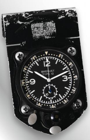 Type 12 Aircraft Clock.Breguet, Type 12, Ref. 2629. Made in the 1950s..Fine and very rare, keyless clock for aeronautical use with.chronograph and instantaneous 15-minute register.